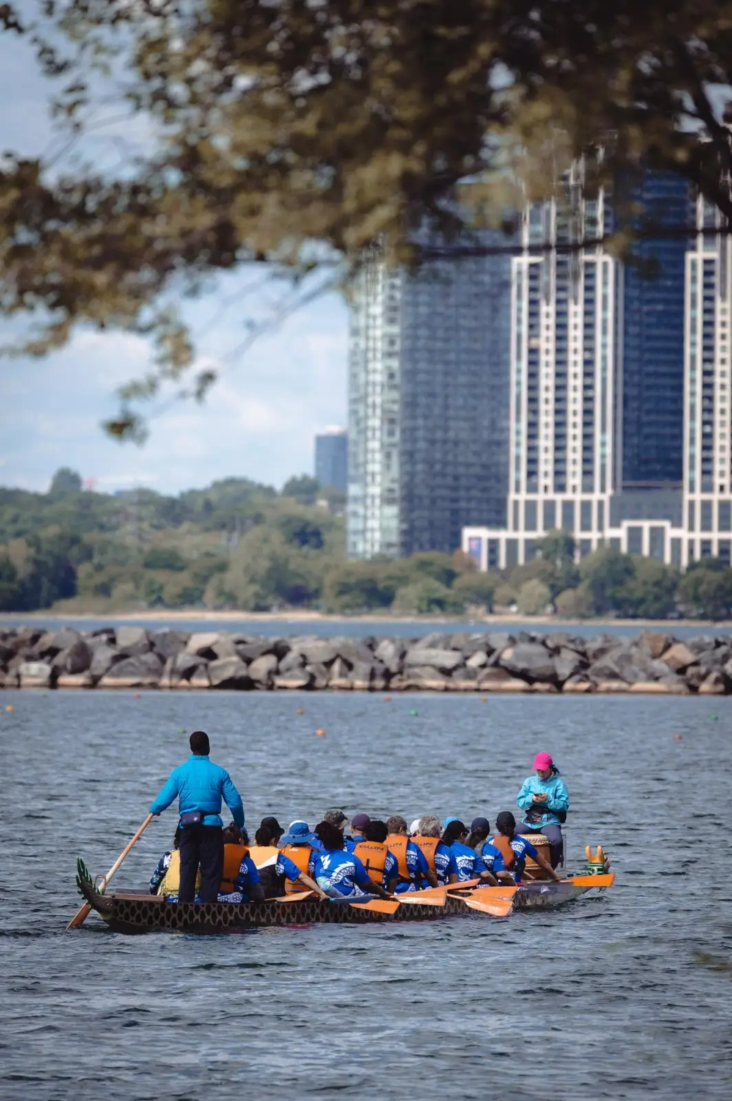 OPS Dragon Boat Team (Toronto) listening to coach at Sunnyside.