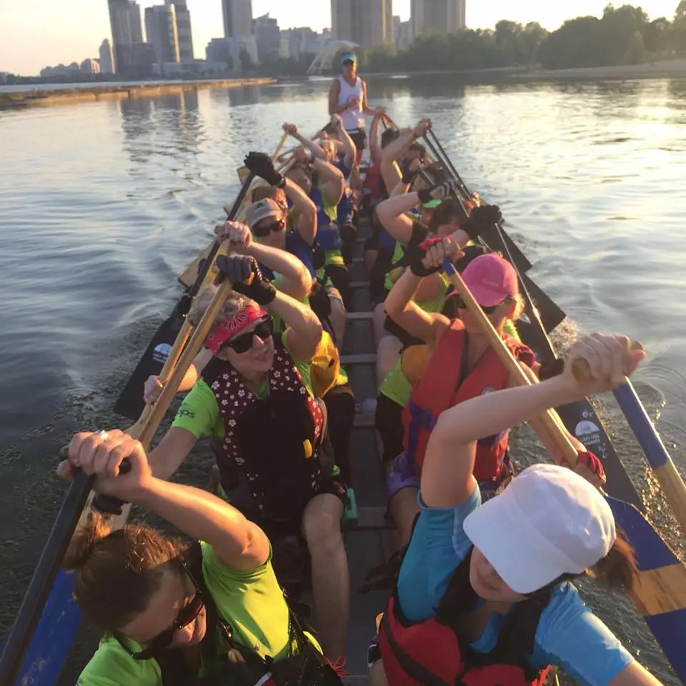 Team getting ready to paddle at Sunnyside beach, Toronto.